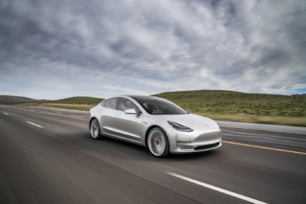 2017-Tesla-Model-3-front-three-quarter-in-motion-02