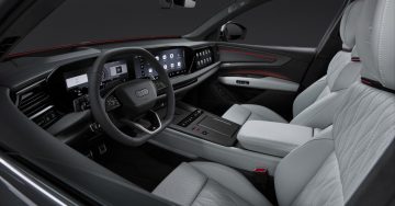Studio photo, interior, steering wheel, infotainment, front sport seats